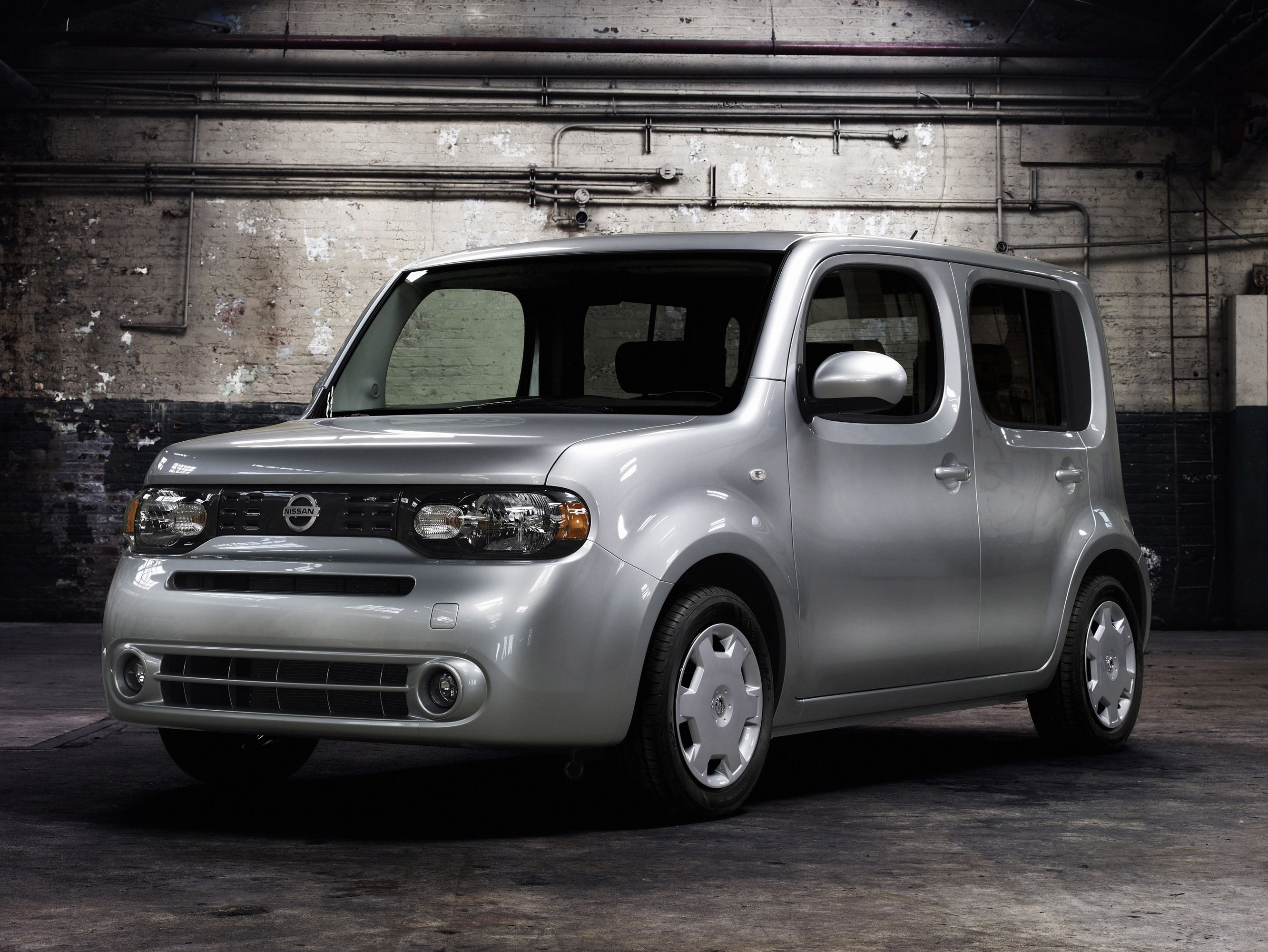 Nissan cube 1 поколение